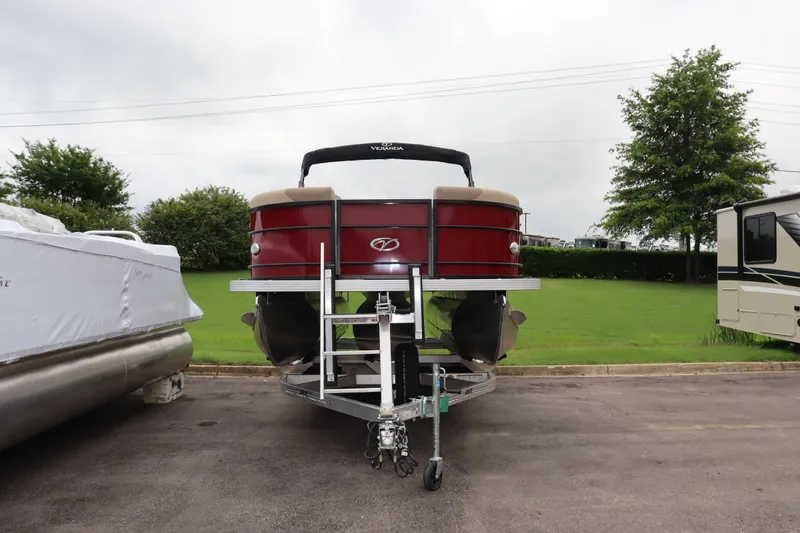 Slide: The Image of 2022 Veranda VR20 RC pontoon boat on trailer, front view. - 2