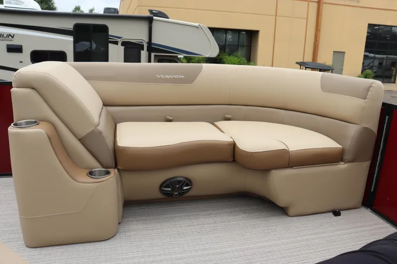 Slide: The Image of 2022 Veranda VR20 RC boat interior with beige and tan seating. - 5