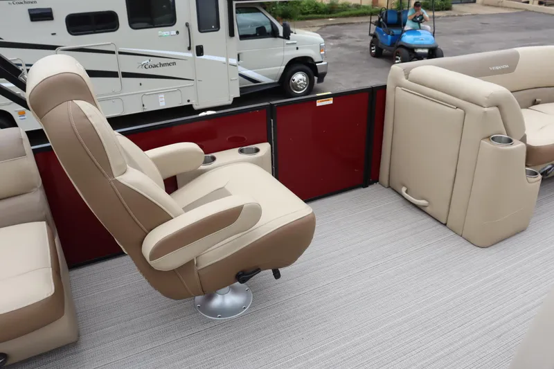 Slide: The Image of 2022 Veranda VR20 RC boat interior with beige seating and red paneling. - 6