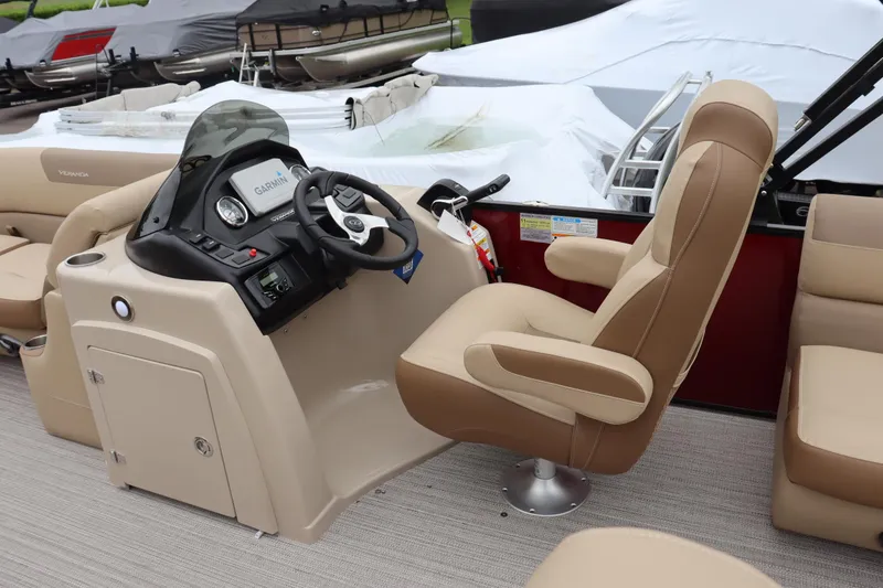 Slide: The Image of 2022 Veranda VR20 RC boat interior with captain's chair and control console. - 7