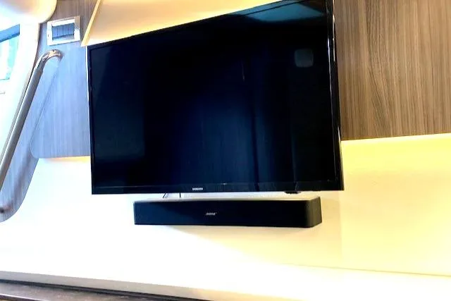 Slide: The Image of V-berth area 32" smart tv w/blu-ray player and sound bar - 35