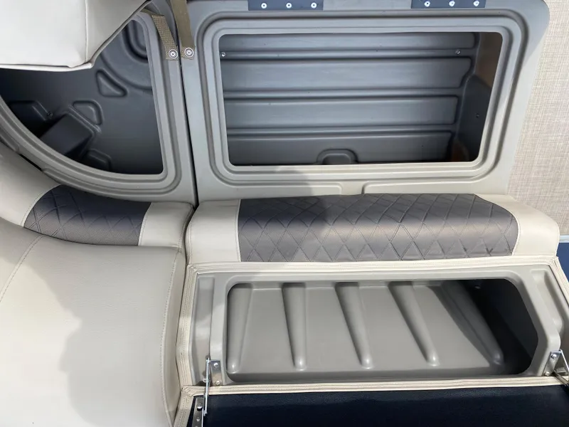 Slide: The Image of 2020 Sun Tracker SportFish 22 DLX storage compartments and seating. - 21