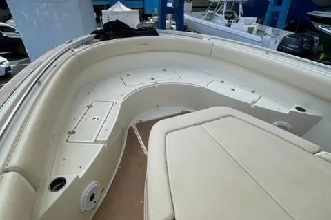 Slide: The Image of 2017 Chris-Craft 35 Catalina boat interior with spacious seating and storage compartments. - 4