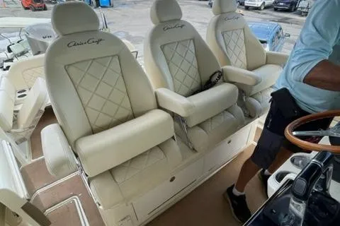 Slide: The Image of Luxurious seating on a 2017 Chris-Craft 35 Catalina boat. - 7