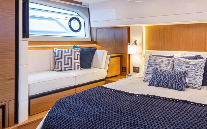 Slide: The Image of Luxurious 2023 Tiara Yachts 49 COUPE bedroom with elegant decor and modern furnishings. - 38
