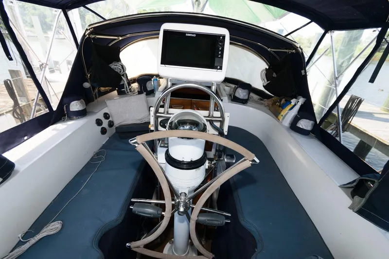 Slide: The Image of Cockpit of a 1988 Tayana 52 sailboat with navigation equipment. - 20