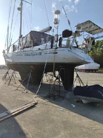 Slide: The Image of 1988 Tayana 52 sailboat Vision Quest III on dry dock for maintenance. - 24