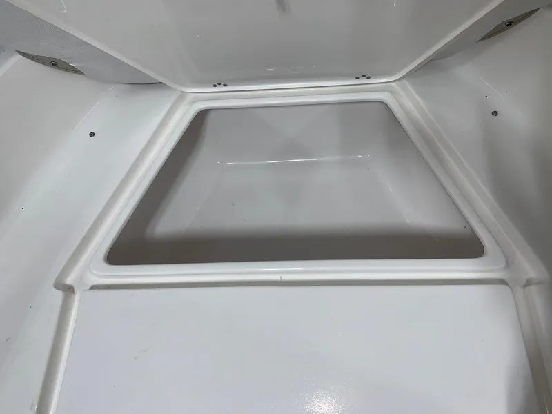 Slide: The Image of 2024 Key West 179 FS boat storage compartment. - 6