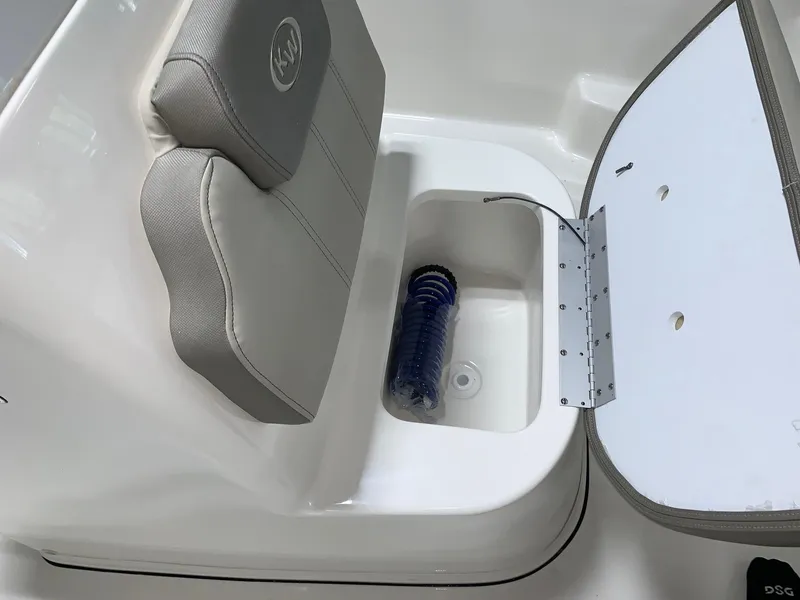 Slide: The Image of 2024 Key West 179 FS boat seat with storage compartment. - 8