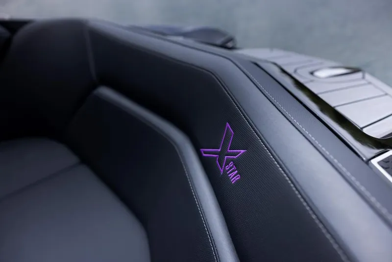 Slide: The Image of 2023 MasterCraft XStar S Piranha interior with embroidered logo. - 10