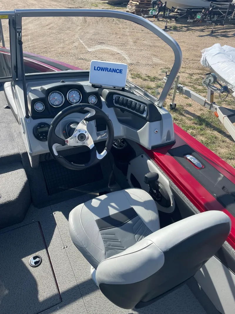 Slide: The Image of 2019 Tracker Targa 19 Combo boat dashboard with Lowrance fishfinder. - 10