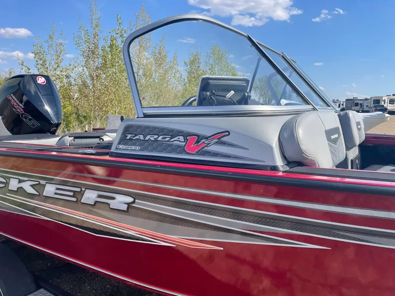 Slide: The Image of 2019 Tracker Targa 19 Combo boat with red and silver detailing. - 2