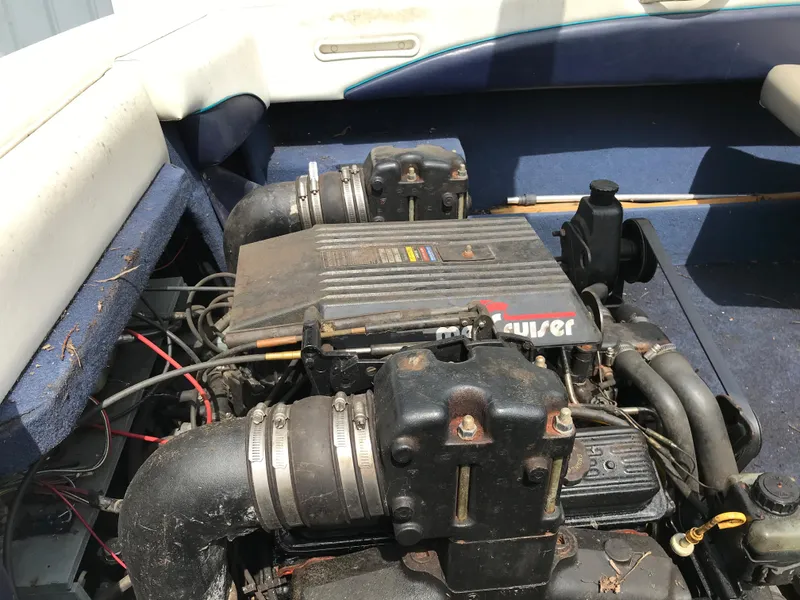Slide: The Image of 1997 Bayliner 2050 boat engine compartment with MerCruiser engine. - 38