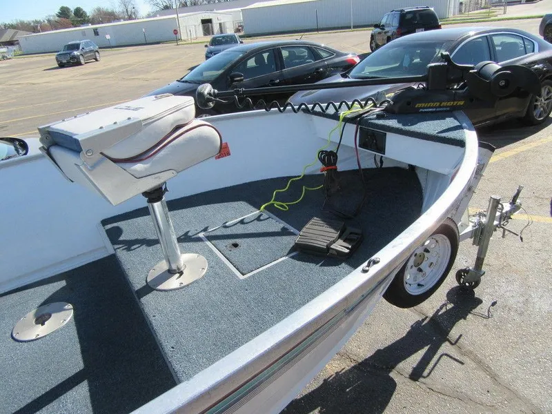 Slide: The Image of 1994 Lowe 1605 SC fishing boat with trolling motor and swivel seat. - 3