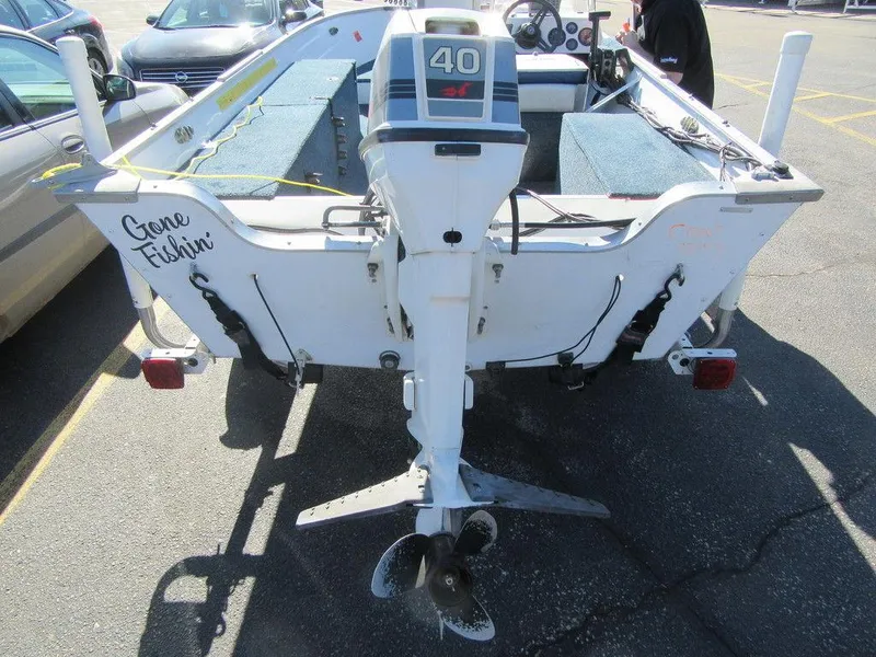 Slide: The Image of 1994 Lowe 1605 SC boat with 40 HP outboard motor, rear view. - 6