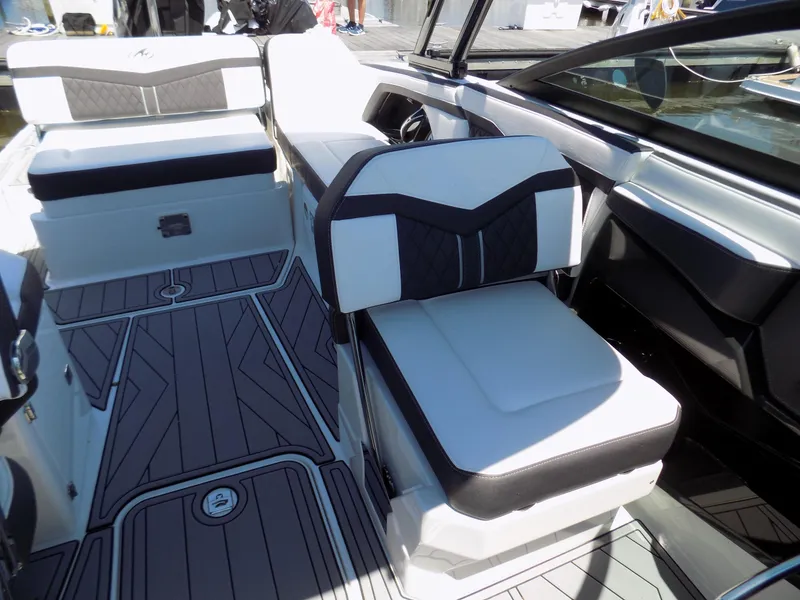 Slide: The Image of 2021 Monterey 255 Super Sport boat interior with sleek seating and modern design. - 10