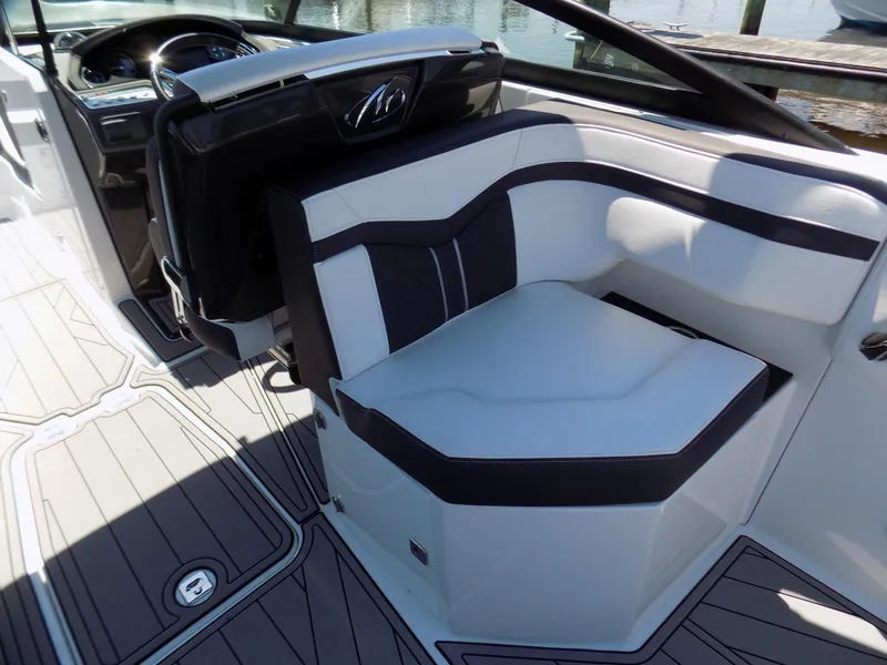 Slide: The Image of 2021 Monterey 255 Super Sport boat interior with sleek seating and modern design. - 15