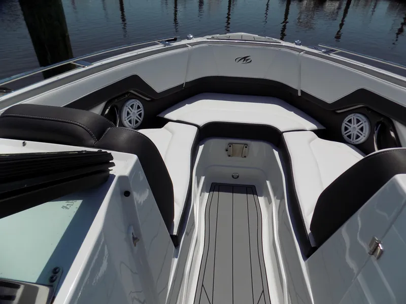 Slide: The Image of 2021 Monterey 255 Super Sport boat interior with sleek seating and modern design. - 5