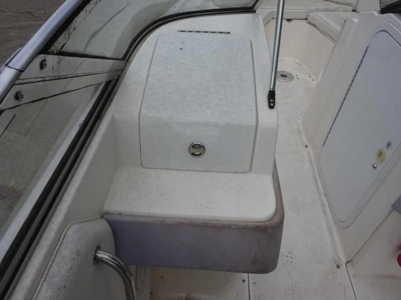 Slide: The Image of 1996 Wellcraft 2400S ECLIPSE boat interior, showing seating and storage compartments. - 14