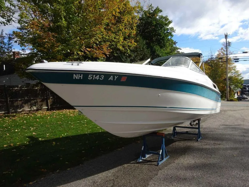 Slide: The Image of 1996 Wellcraft 2400S ECLIPSE boat on stands, side view, outdoors. - 5