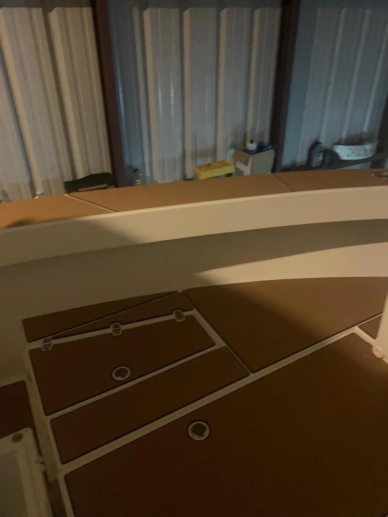 Slide: The Image of 2012 Ocean Master 336 CC boat interior with storage compartments. - 20