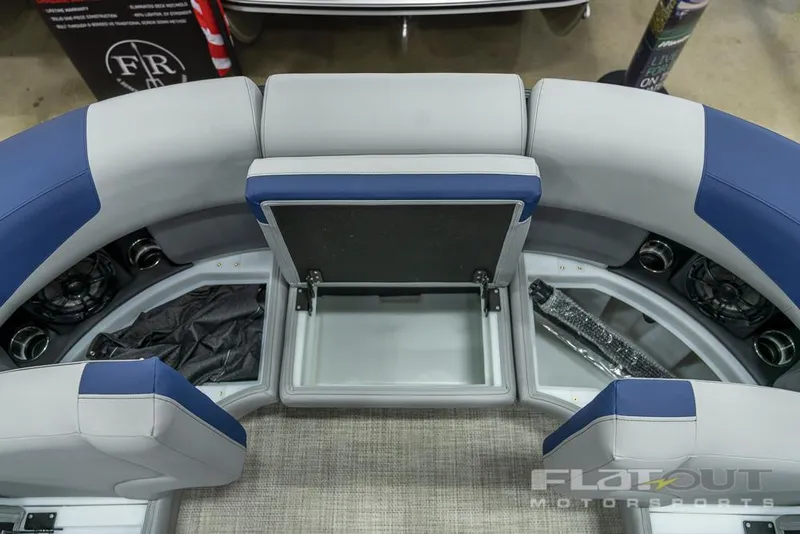 Slide: The Image of 2022 South Bay 525 RS 3.0 Arch 250HP boat interior with open storage compartment. - 10
