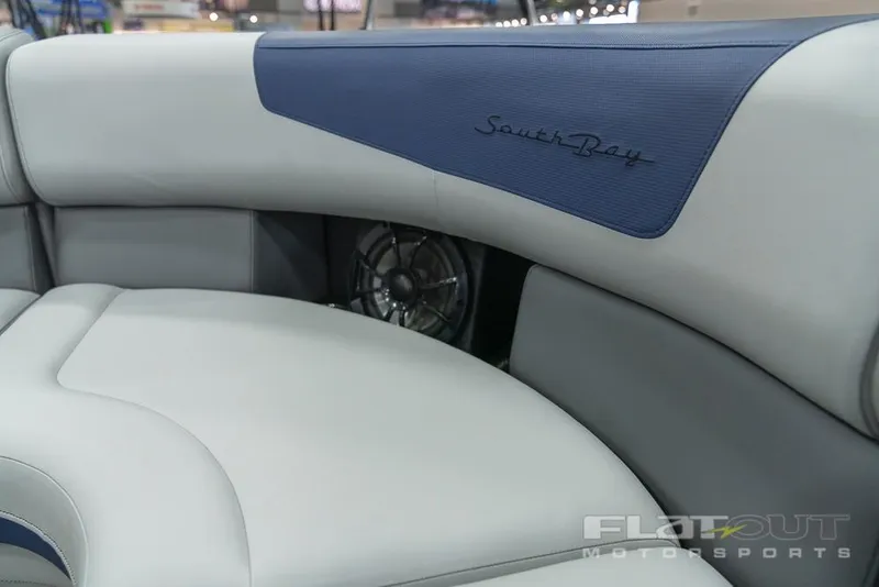 Slide: The Image of 2022 South Bay 525 RS 3.0 Arch 250HP boat interior with premium seating. - 11