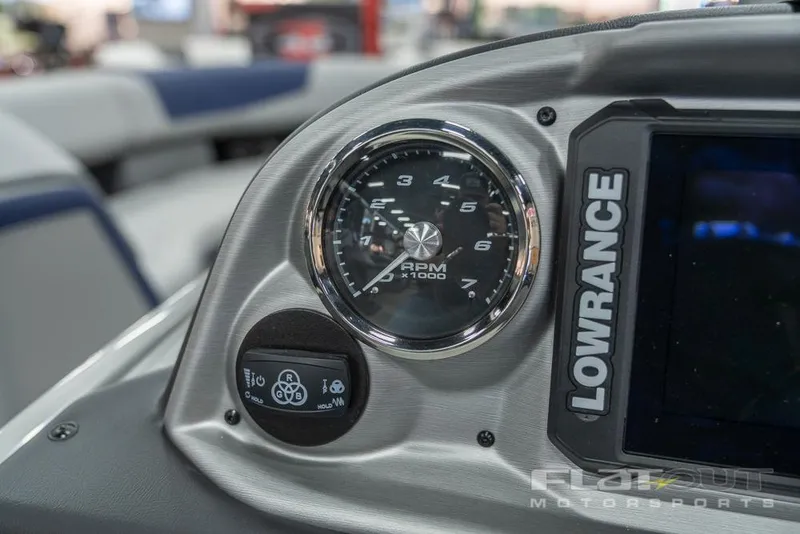 Slide: The Image of Close-up of 2022 South Bay 525 RS 3.0 Arch 250HP dashboard with Lowrance display. - 15