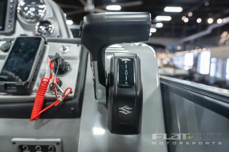 Slide: The Image of Close-up of the throttle control on a 2022 South Bay 525 RS 3.0 Arch 250HP boat. - 19