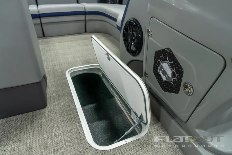 Slide: The Image of 2022 South Bay 525 RS 3.0 Arch 250HP interior storage compartment and speaker system. - 23