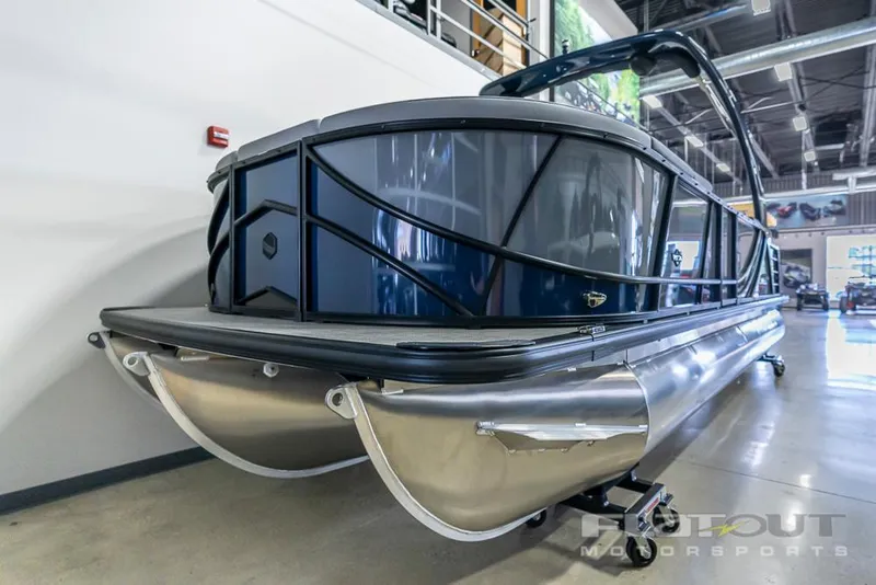 Slide: The Image of 2022 South Bay 525 RS 3.0 Arch 250HP pontoon boat in showroom. - 3