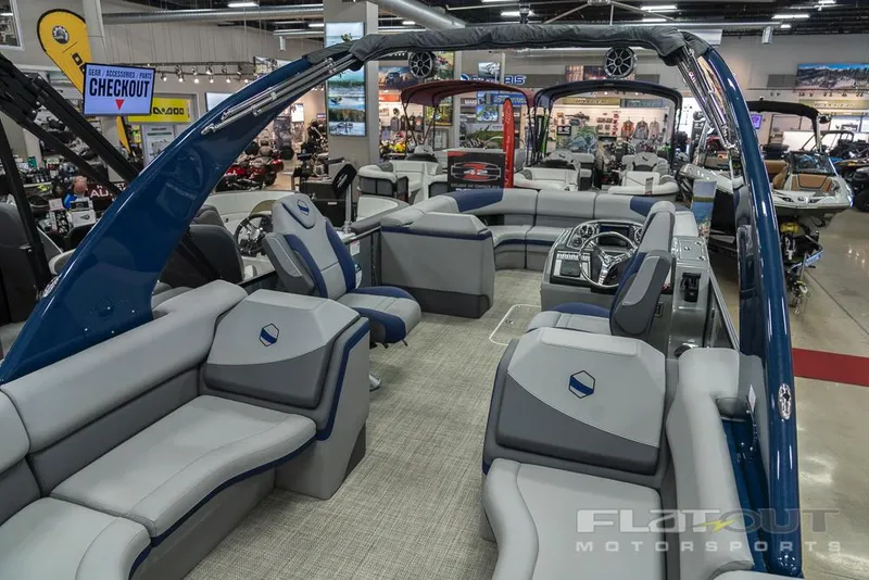 Slide: The Image of 2022 South Bay 525 RS 3.0 Arch 250HP pontoon boat interior at a showroom. - 32