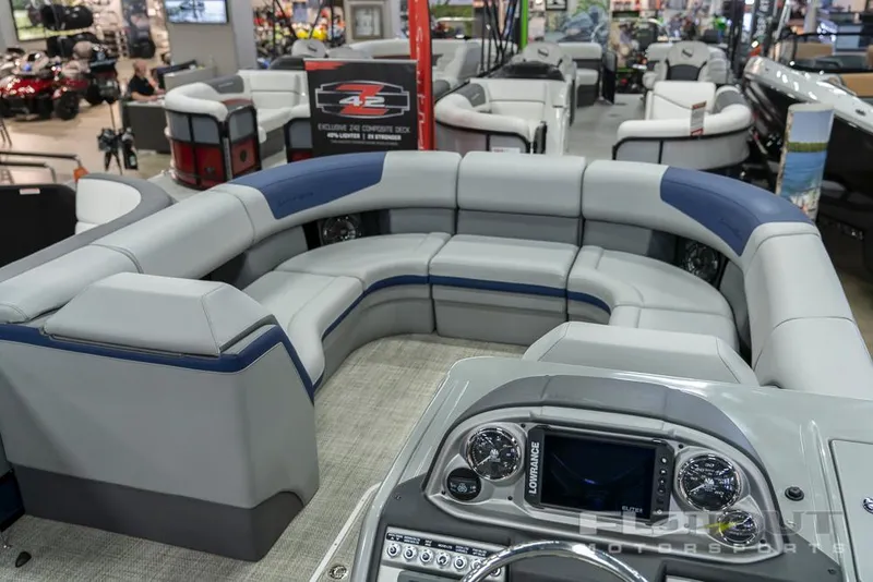 Slide: The Image of 2022 South Bay 525 RS 3.0 Arch 250HP pontoon boat interior at a boat show. - 6