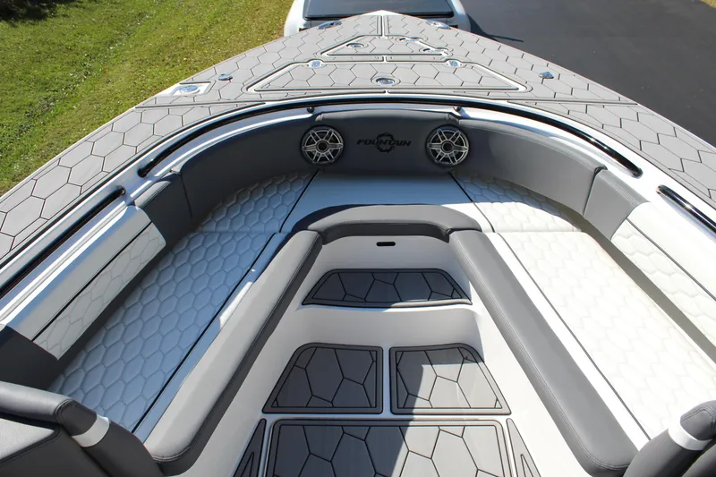Slide: The Image of 2023 Fountain 34 SC boat interior with sleek seating and modern design. - 7