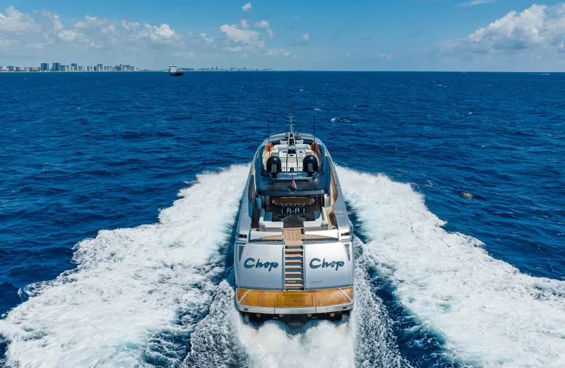 Slide: The Image of Riva Mythos Motoryacht 2014 cruising on open sea, leaving a wake behind. - 10