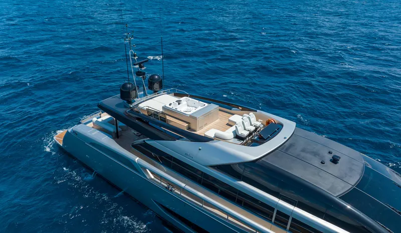 Slide: The Image of Luxurious 2014 Riva Mythos Motoryacht cruising on open blue sea. - 12