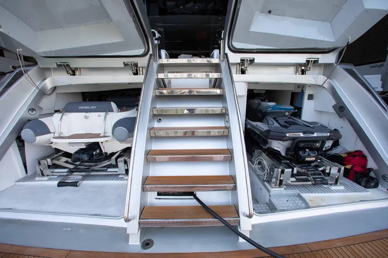 Slide: The Image of Riva Mythos Motoryacht 2014 with open storage compartments and watercraft. - 42