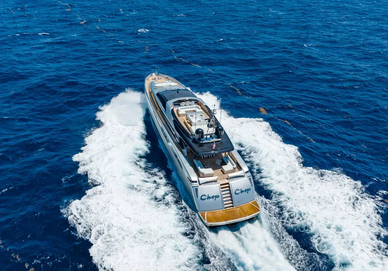 Slide: The Image of 2014 Riva Mythos Motoryacht cruising on open blue sea, aerial view. - 9