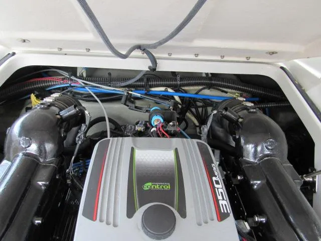 Slide: The Image of Engine compartment of a 2016 Crownline 255 SS boat with a 350 HP engine. - 22