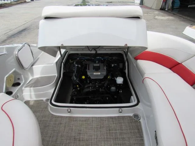 Slide: The Image of 2016 Crownline 255 SS boat engine compartment with open hatch. - 24