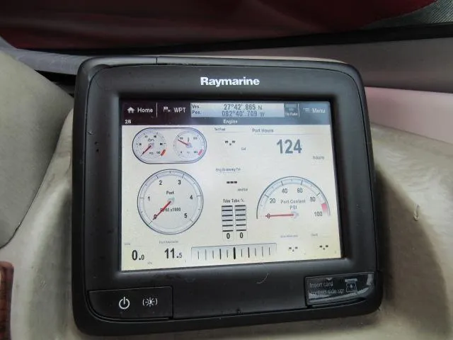 Slide: The Image of Raymarine display on 2016 Crownline 255 SS boat showing engine metrics. - 27