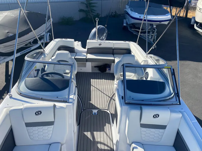 Slide: The Image of 2022 Hurricane SD217OB boat interior with seating and steering console. - 5