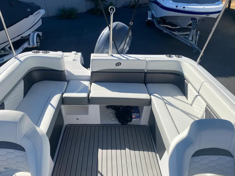 Slide: The Image of 2022 Hurricane SD217OB boat interior with spacious seating and modern design. - 6