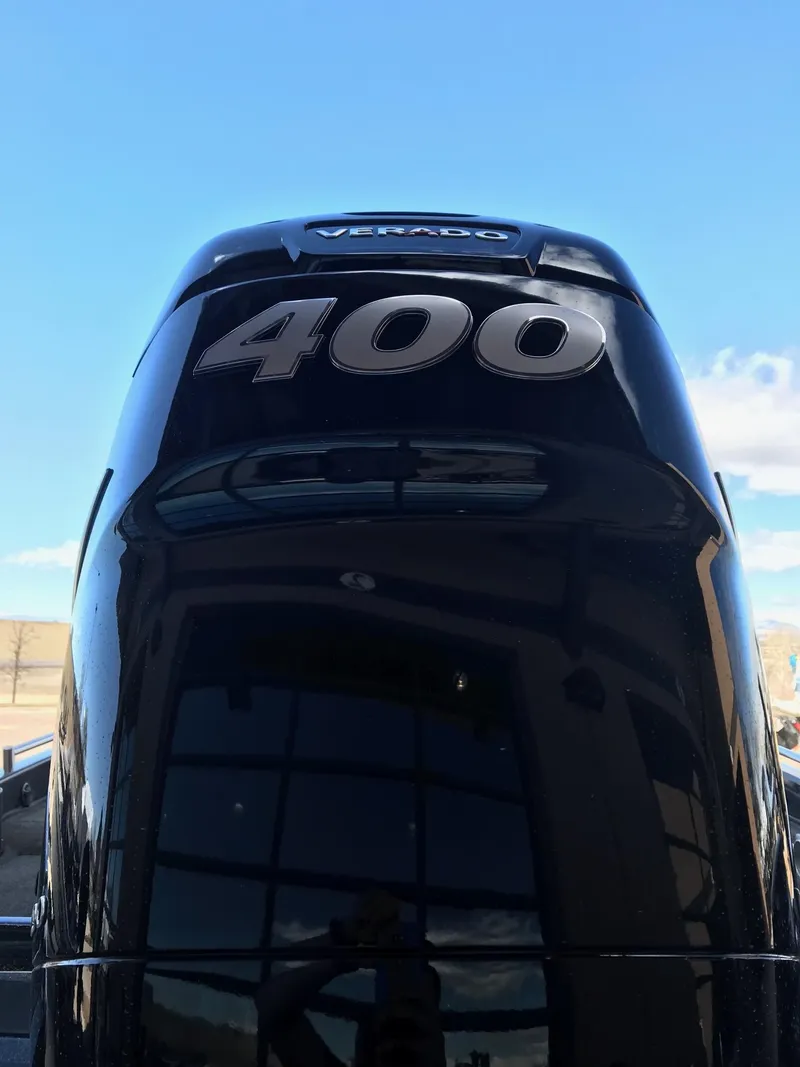 Slide: The Image of 2022 Nitro ZV21 boat with powerful 400 horsepower engine against blue sky. - 3