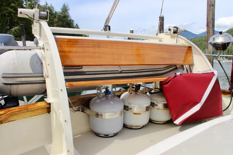 Slide: The Image of Sailboat deck with propane tanks and equipment, Skookum 53, 1981 model. - 27