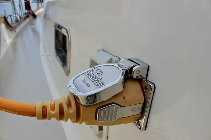 Slide: The Image of Power connection on 1981 Skookum 53 boat with yellow cable. - 31