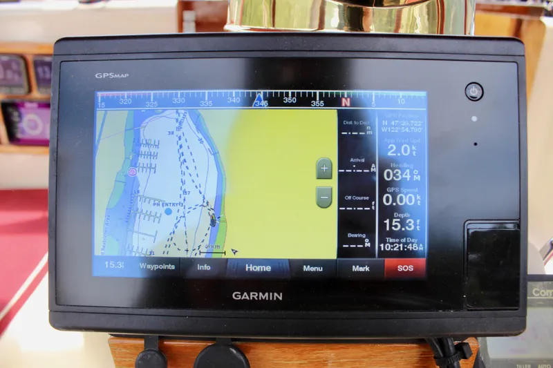 Slide: The Image of Garmin GPS display on Skookum 53, 1981 model, showing nautical navigation map. - 41