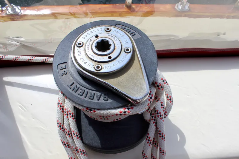 Slide: The Image of Winch on 1981 Skookum 53 sailboat with rope wrapped around it. - 49