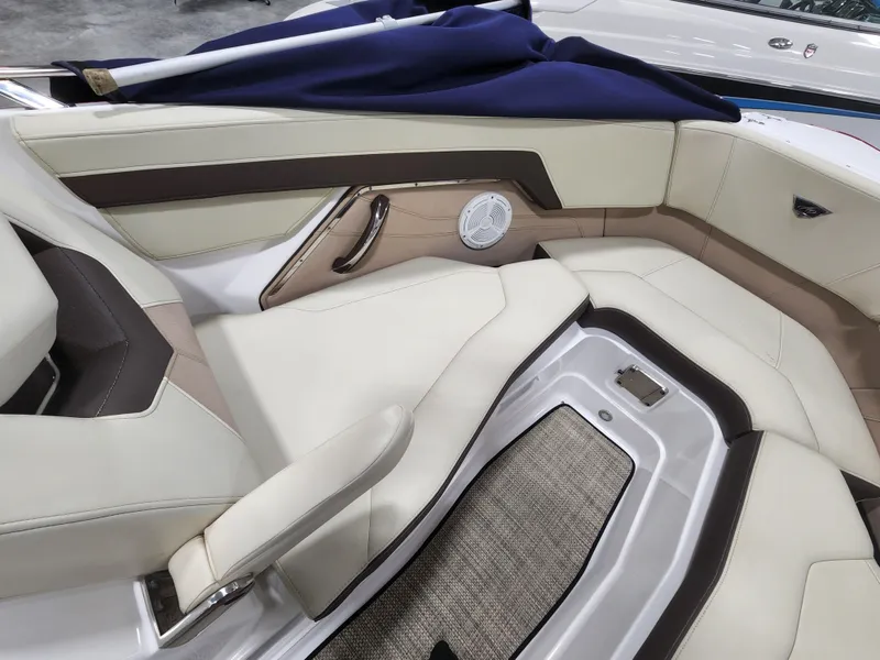 Slide: The Image of 2015 Monterey 268 Super Sport BR interior seating with beige and brown upholstery. - 14
