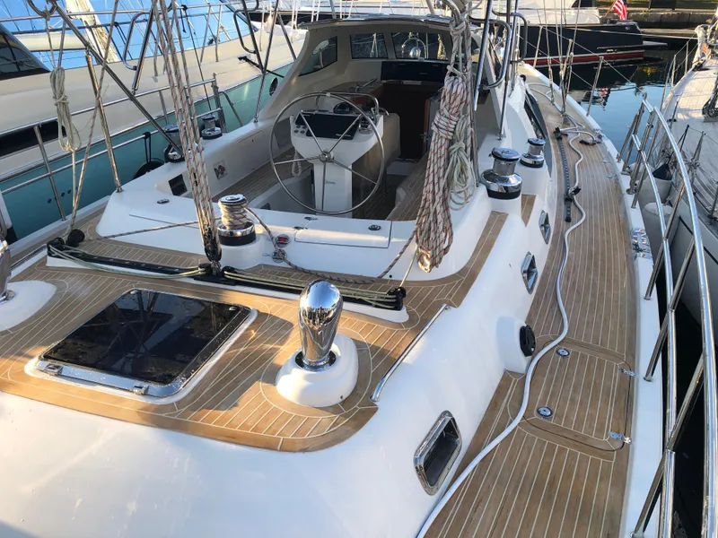 Slide: The Image of 2020 Bluewater 56 yacht with sleek deck design and modern cockpit. - 16